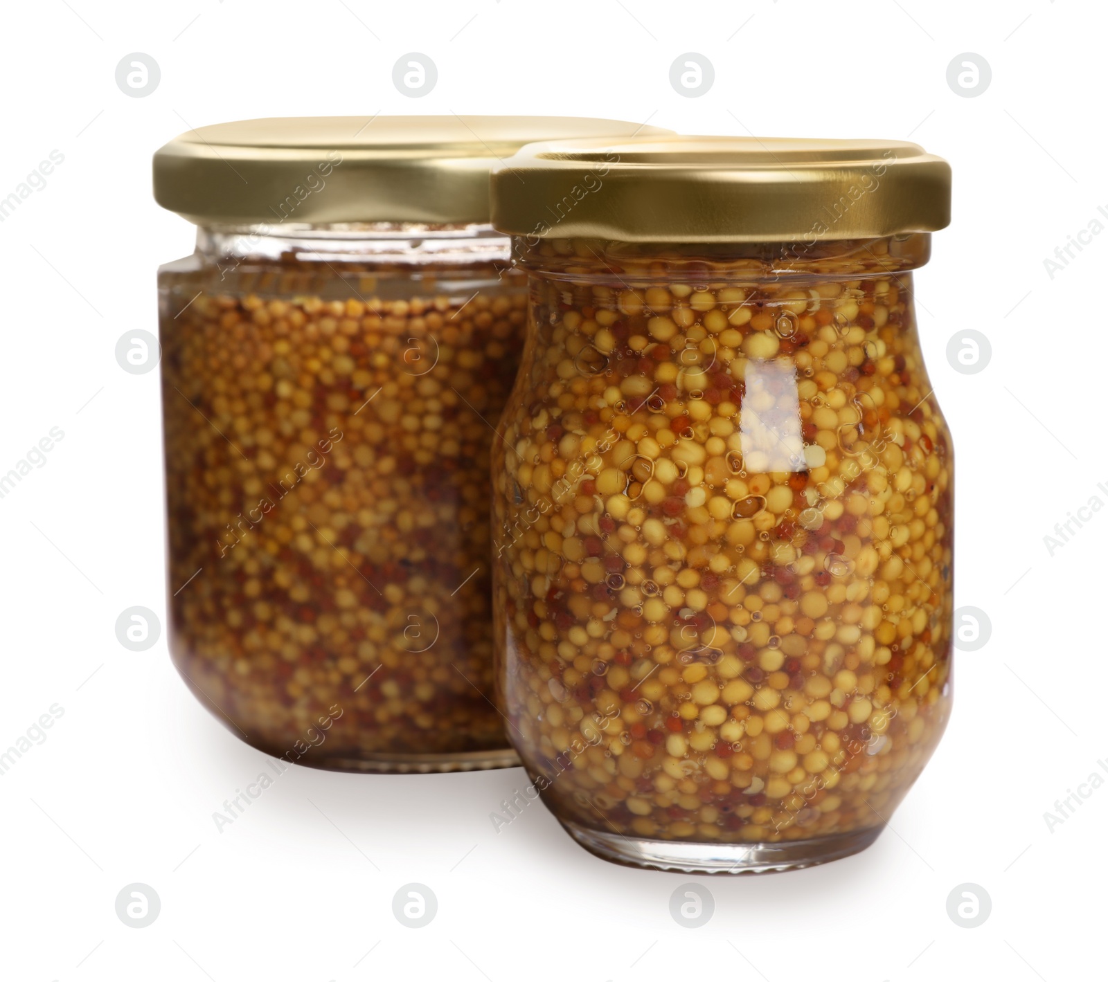 Photo of Jars of whole grain mustard on white background