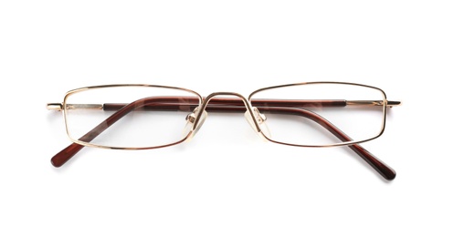 Photo of Glasses with corrective lenses on white background. Vision problem