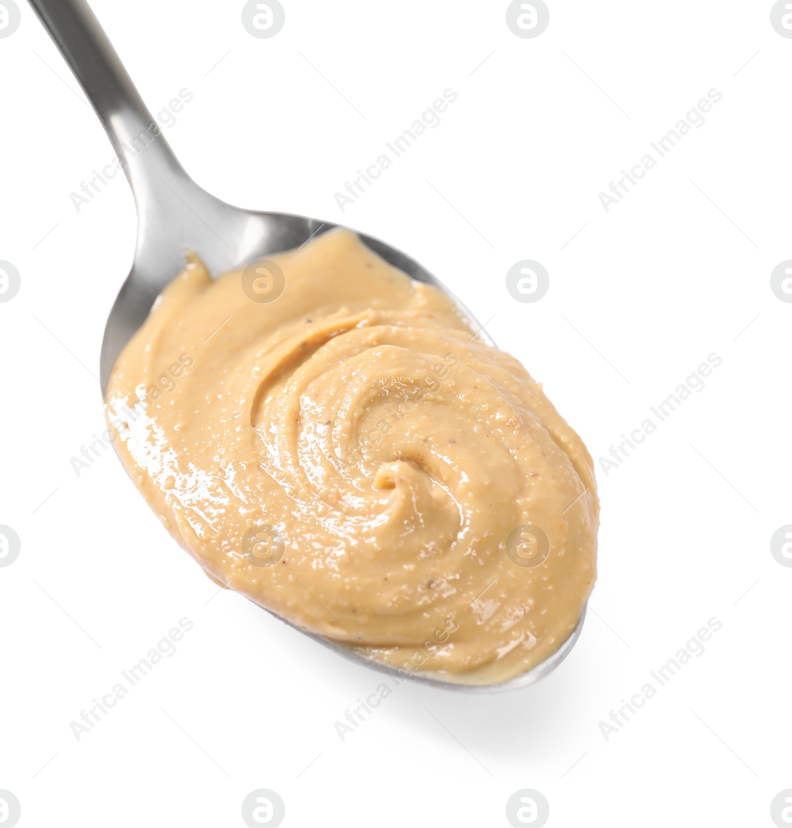 Photo of Delicious nut butter in spoon isolated on white