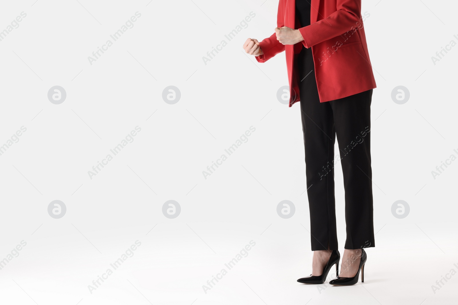 Photo of Businesswoman with angry fists on white background, closeup