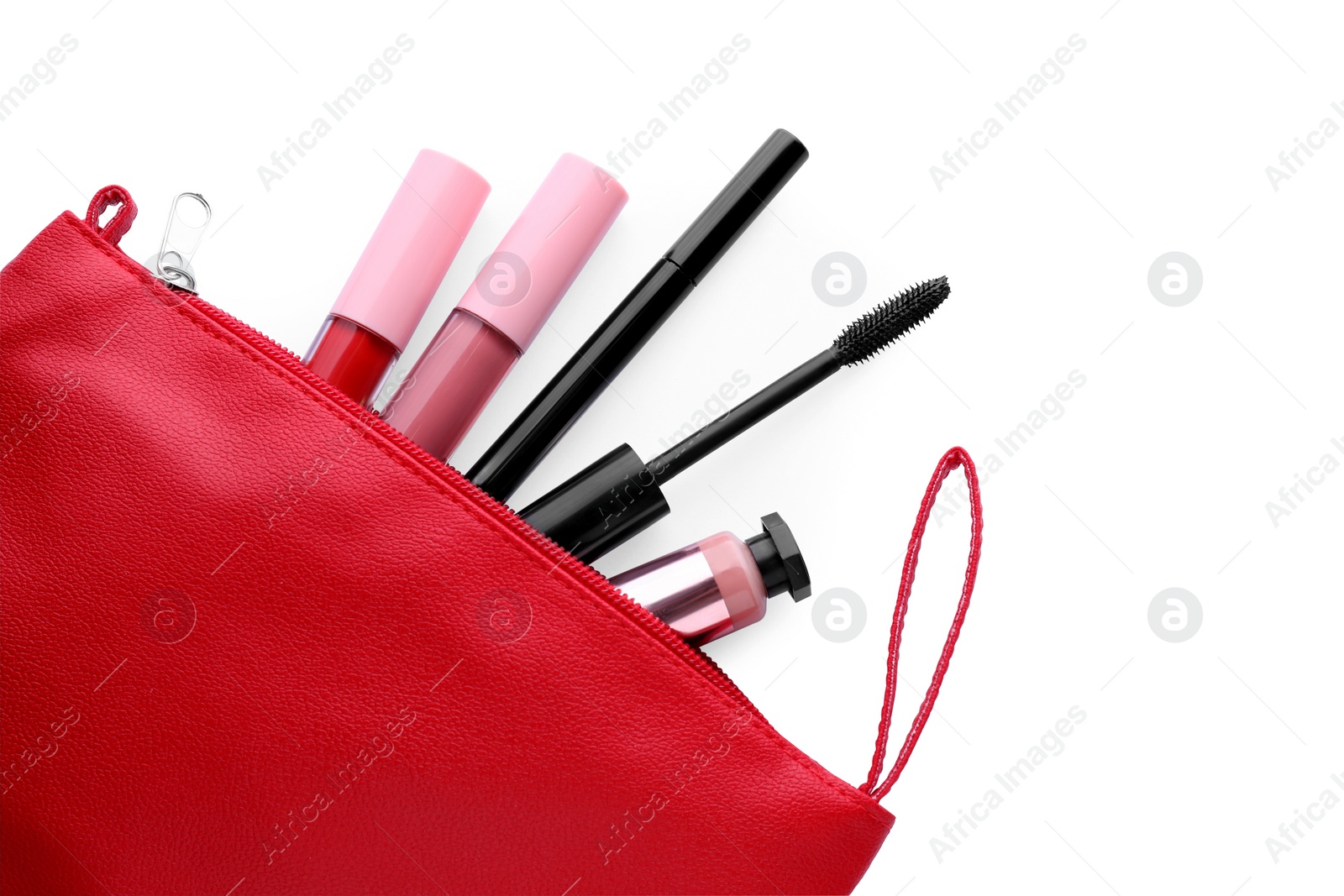 Photo of Black eyeliner and other makeup products in cosmetic bag on white background, top view