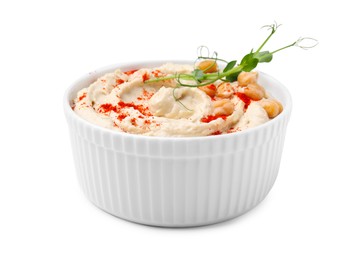 Photo of Bowl of delicious hummus with chickpeas and paprika isolated on white