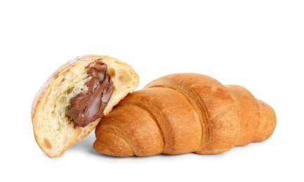 Tasty croissants with chocolate on white background