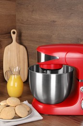 Photo of Composition with modern red stand mixer and different products on wooden table