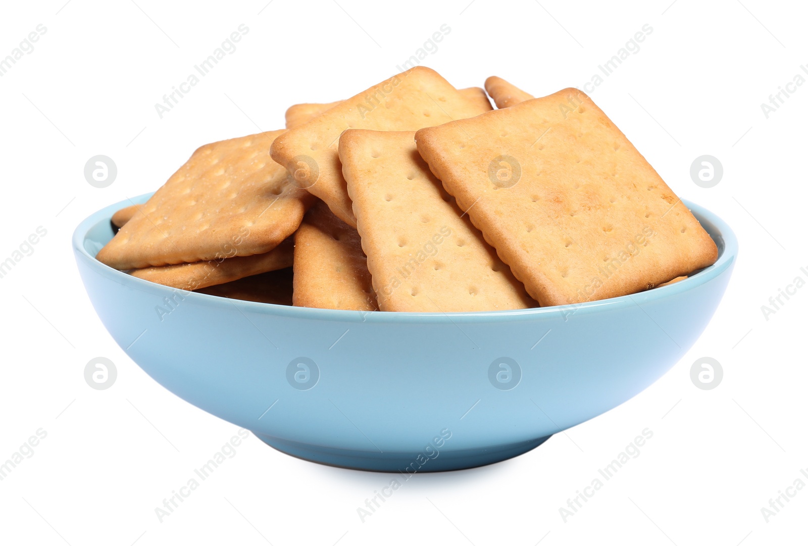 Photo of Tasty crackers in bowl isolated on white