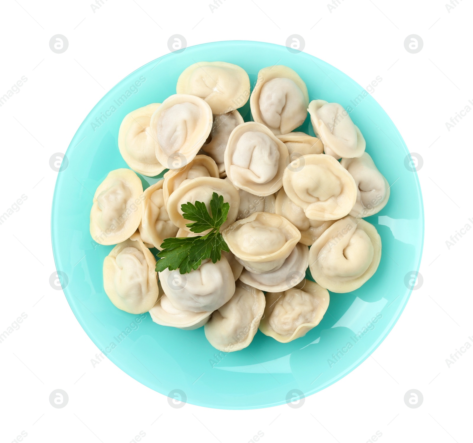 Photo of Plate with tasty dumplings isolated on white, top view