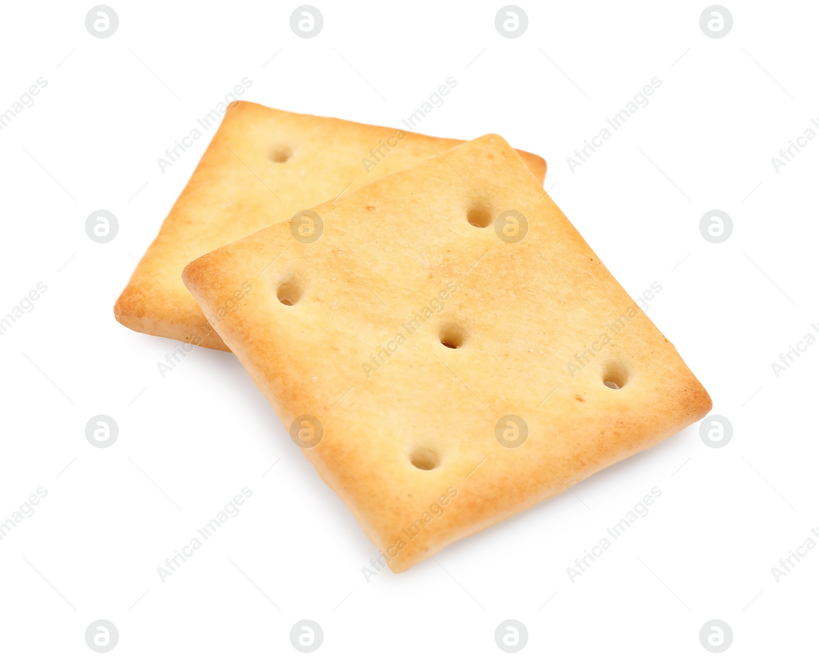 Photo of Two crispy crackers isolated on white. Delicious snack