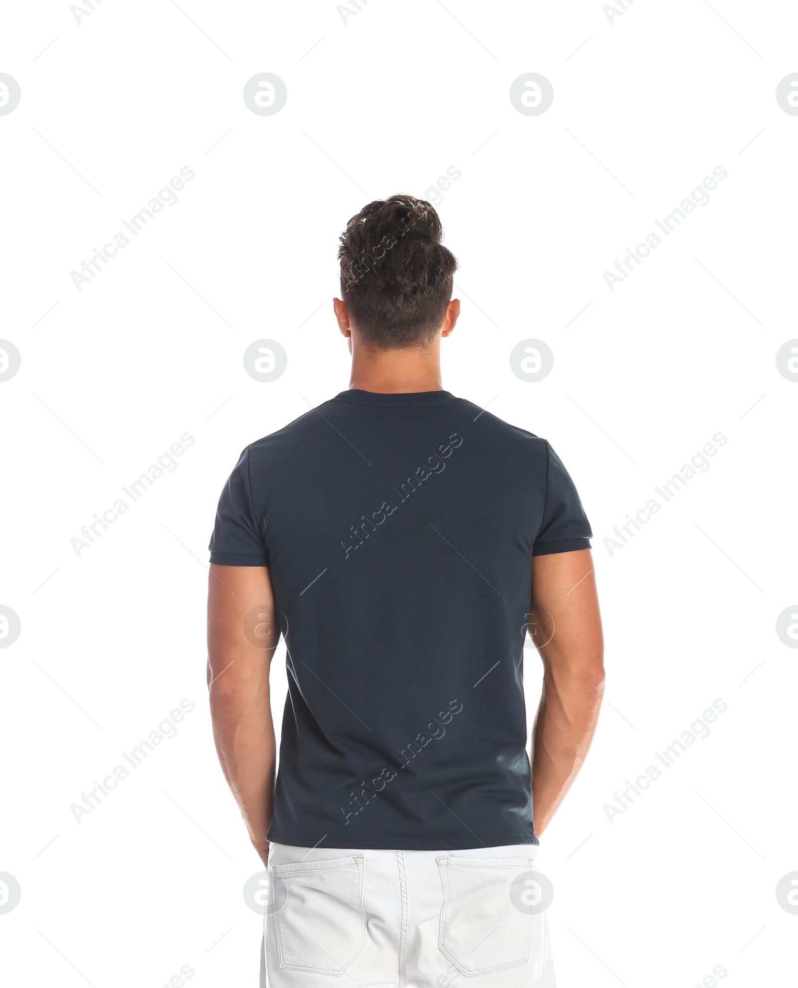 Photo of Young man in t-shirt on white background. Mockup for design