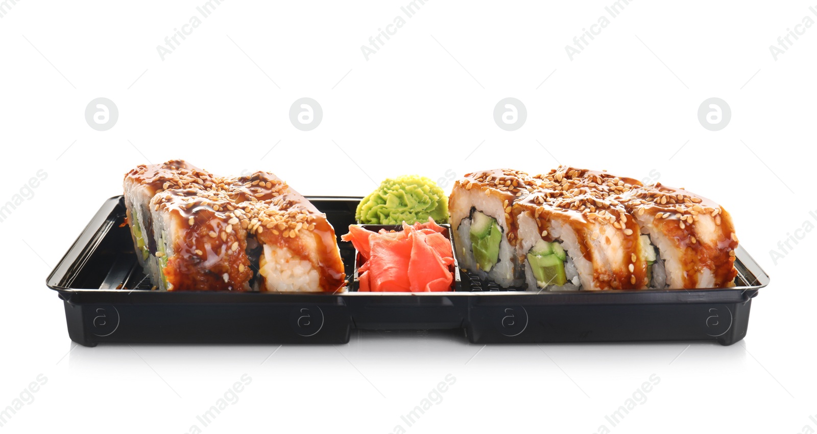 Photo of Box with tasty sushi rolls on white background. Food delivery