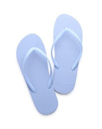 Photo of Stylish blue flip flops on white background, top view