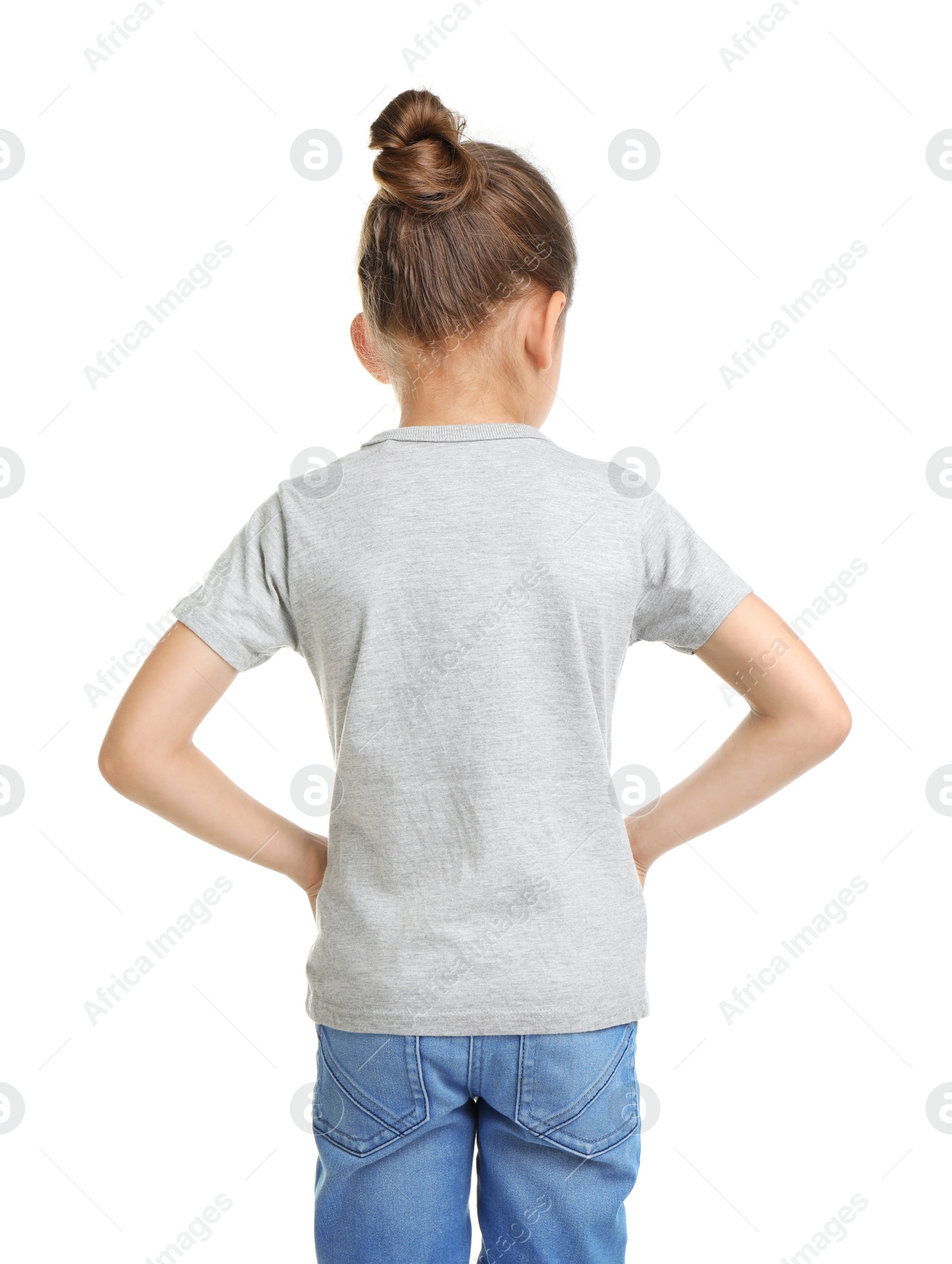 Photo of Little girl in t-shirt on white background. Mockup for design