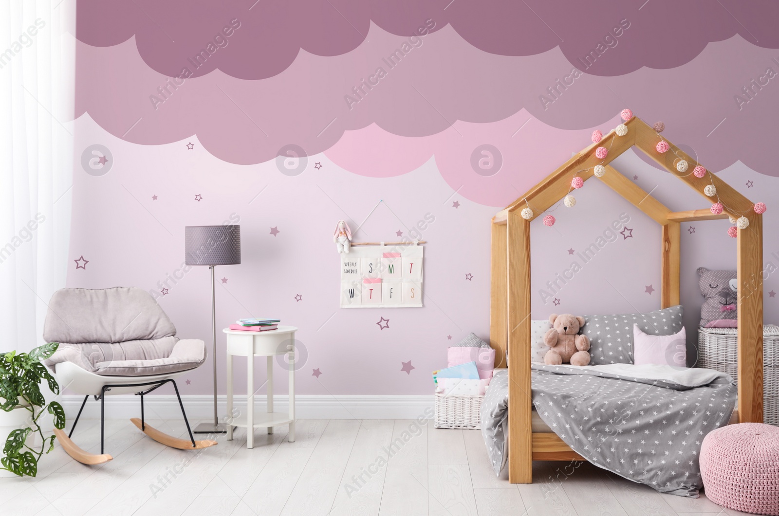 Image of Stylish child room interior with comfortable bed