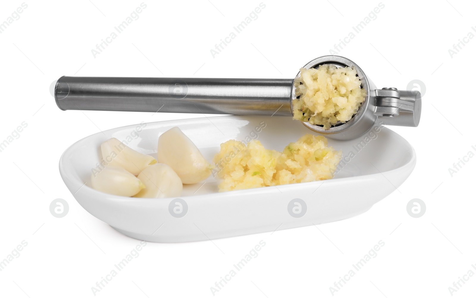 Photo of One metal press and garlic isolated on white