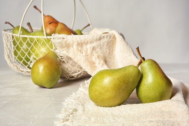 Photo of Composition with tasty ripe pears on table