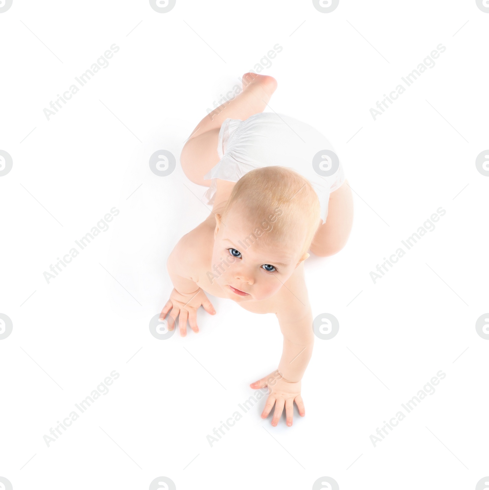 Photo of Cute little baby crawling on white background, top view