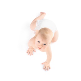 Cute little baby crawling on white background, top view