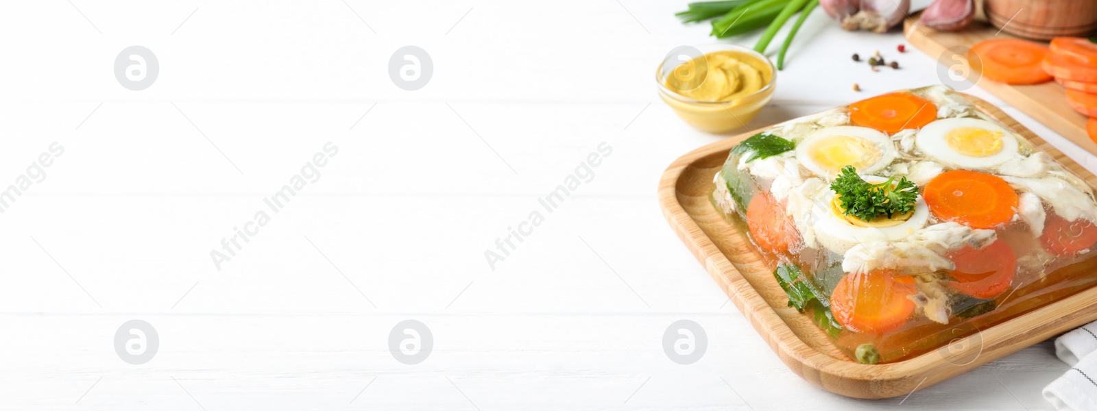 Image of Delicious fish aspic served on white wooden table, space for text. Banner design