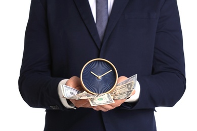 Businessman holding alarm clock and cash on white background. Time is money concept