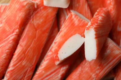 Photo of Fresh red crab sticks as background, closeup