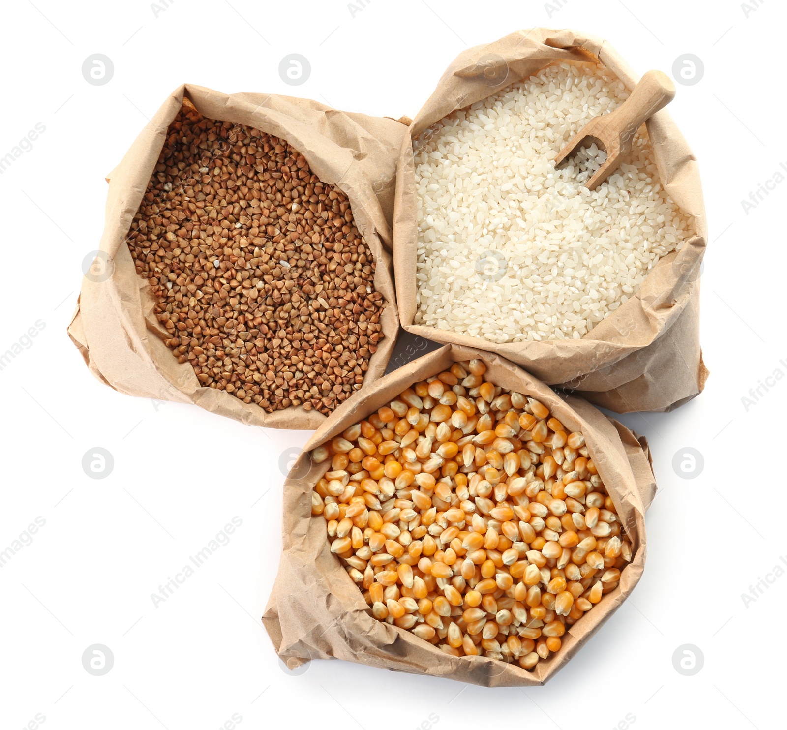 Photo of Paper bags with different types of grains and cereals on white background