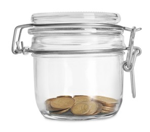 Glass jar with coins isolated on white