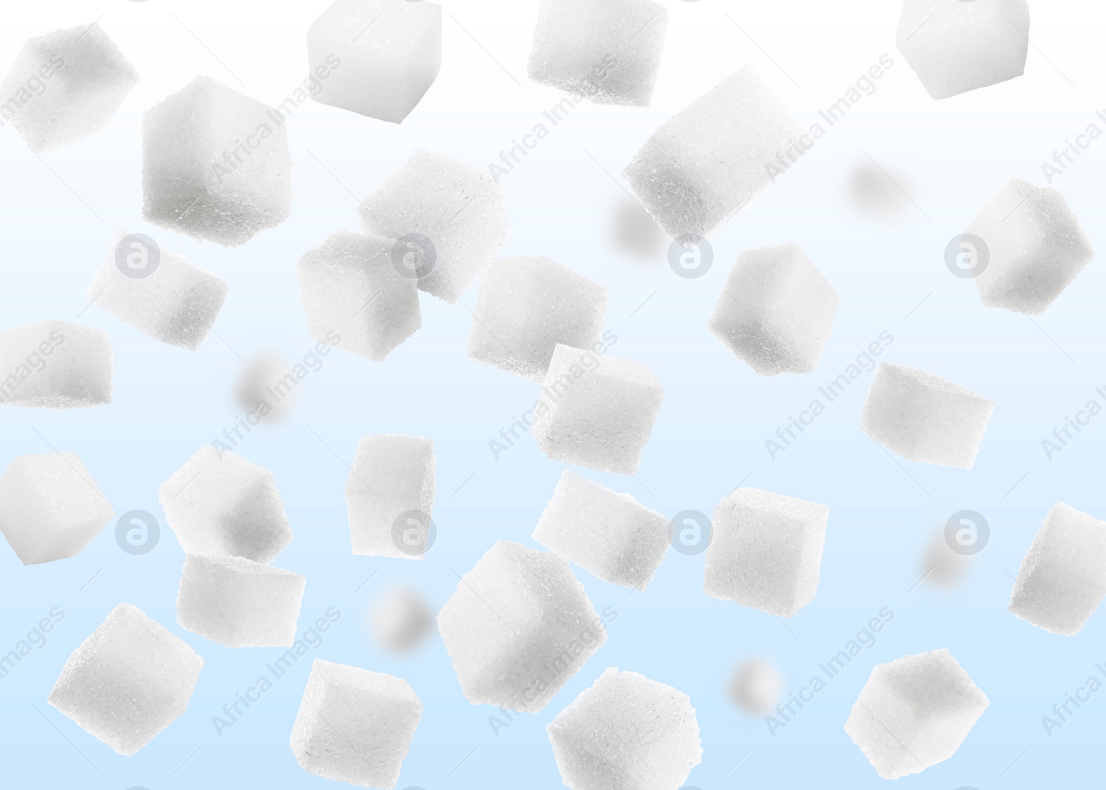 Image of Refined sugar cubes in air on color gradient background