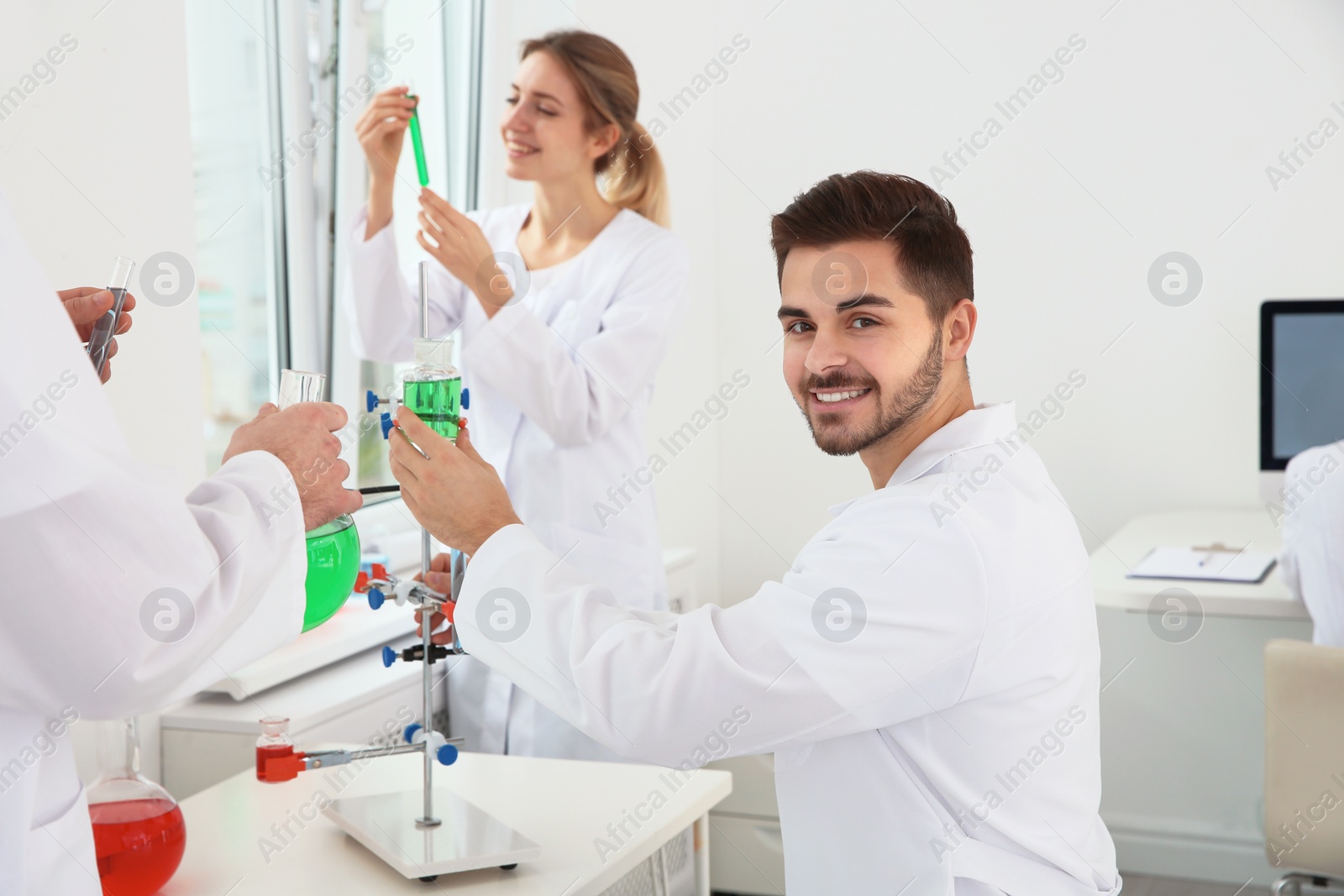 Photo of Medical students working in modern scientific laboratory