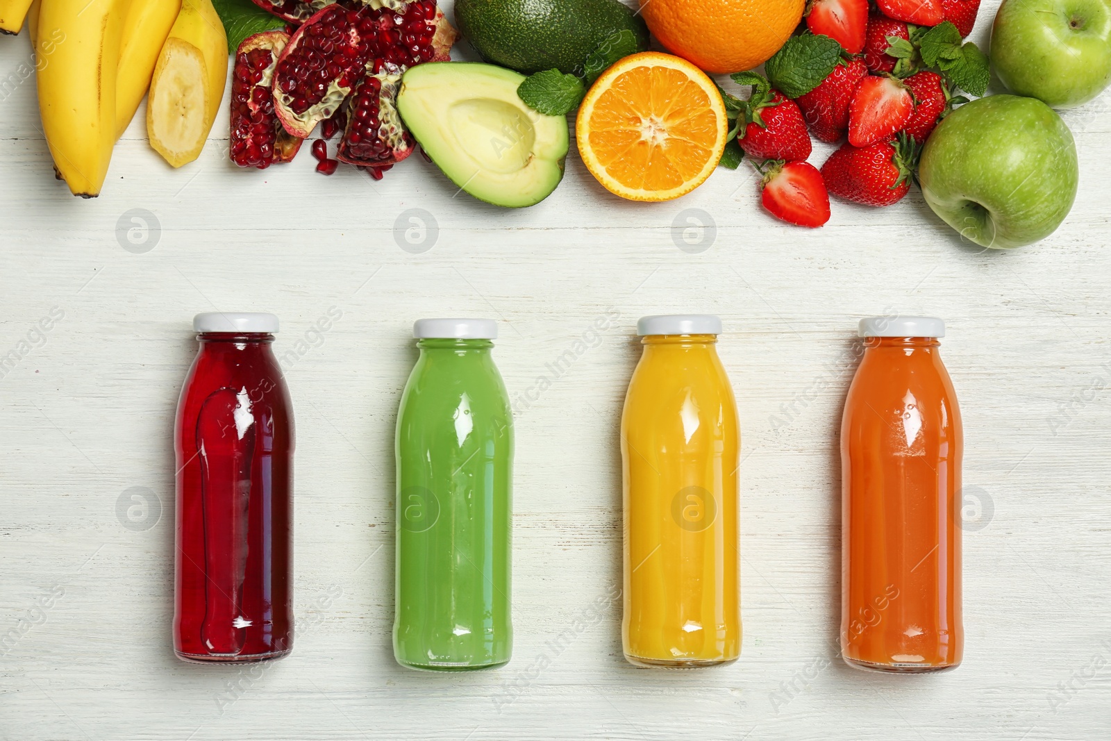 Photo of Flat lay composition with tasty juices and ingredients on light background