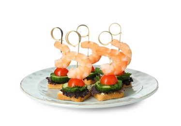 Photo of Tasty canapes with shrimps, cucumber, greens and tomatoes isolated on white