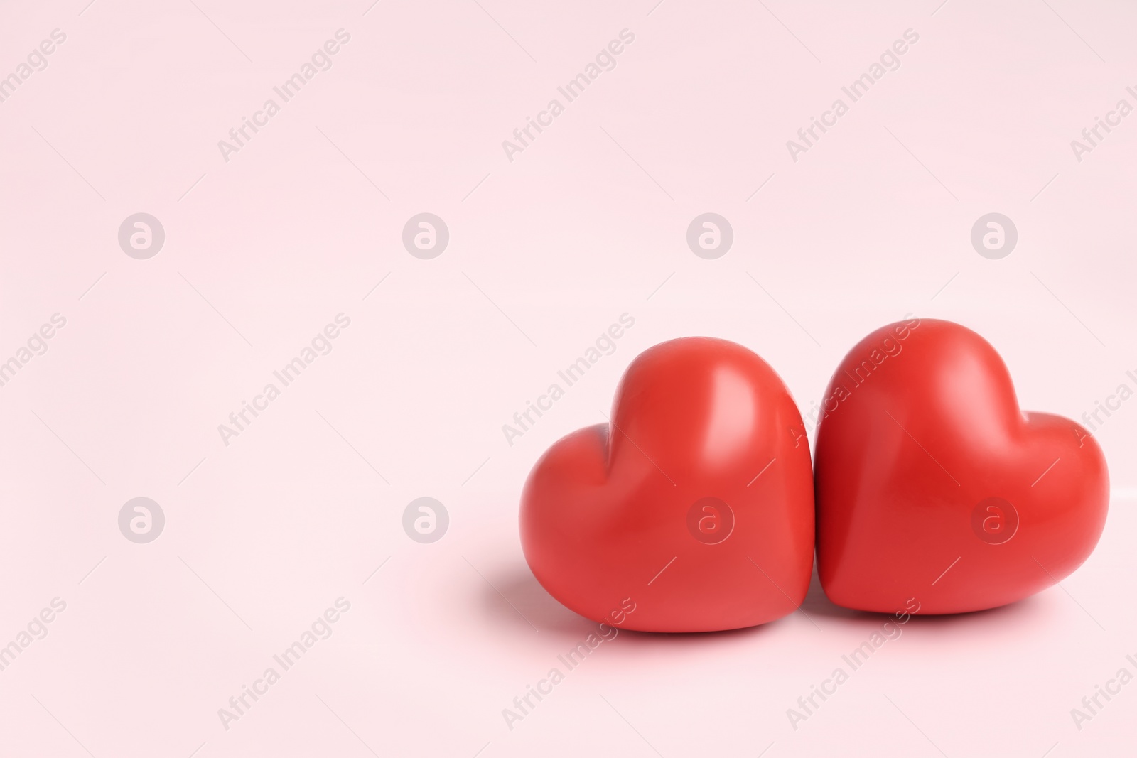 Photo of Red hearts on pink background, space for text. Happy Valentine's Day