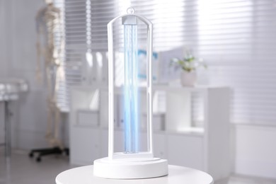 Photo of UV lamp for light sterilization on white table in hospital