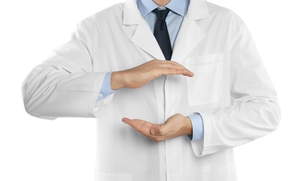 Male doctor holding something on white background, closeup