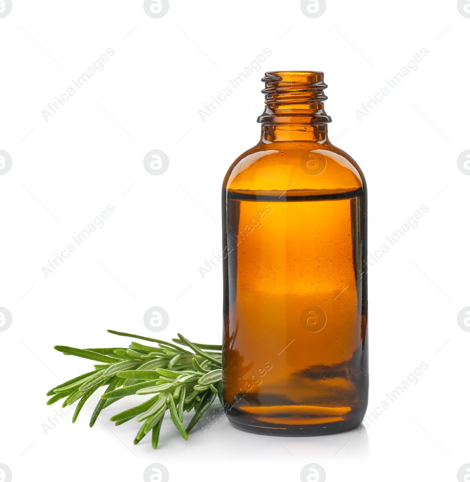 Photo of Bottle with rosemary essential oil and fresh herb on white background