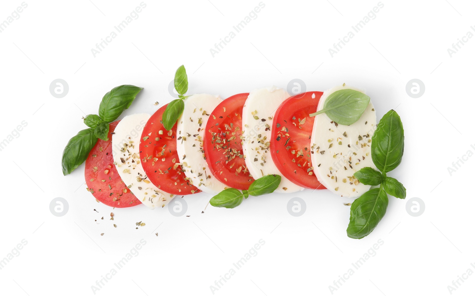 Photo of Tasty salad Caprese with mozzarella, tomatoes, basil and spices on white background, top view