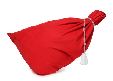 Photo of Merry Christmas. Santa Claus red bag isolated on white
