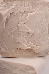 Photo of Texture of compressed yeast as background, closeup