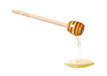 Photo of Natural honey dripping from dipper on white background