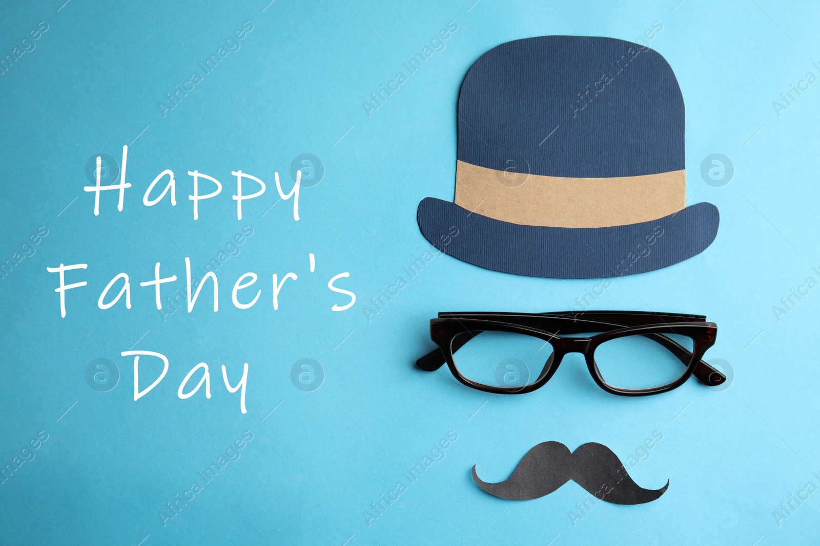 Image of Eyeglasses, paper mustache and hat on light blue background, flat lay. Happy father's day