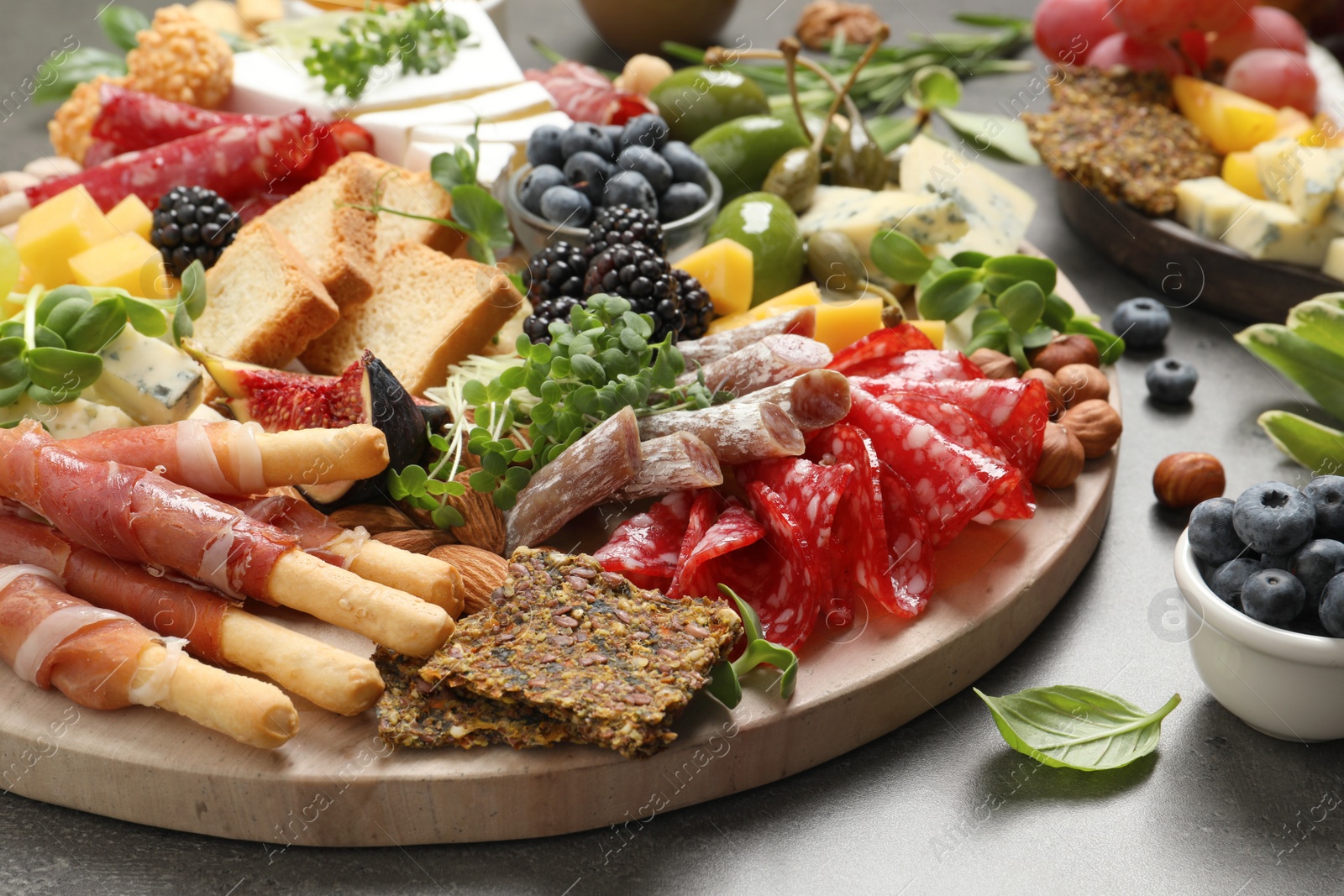 Photo of Many different tasty appetizers on table, closeup