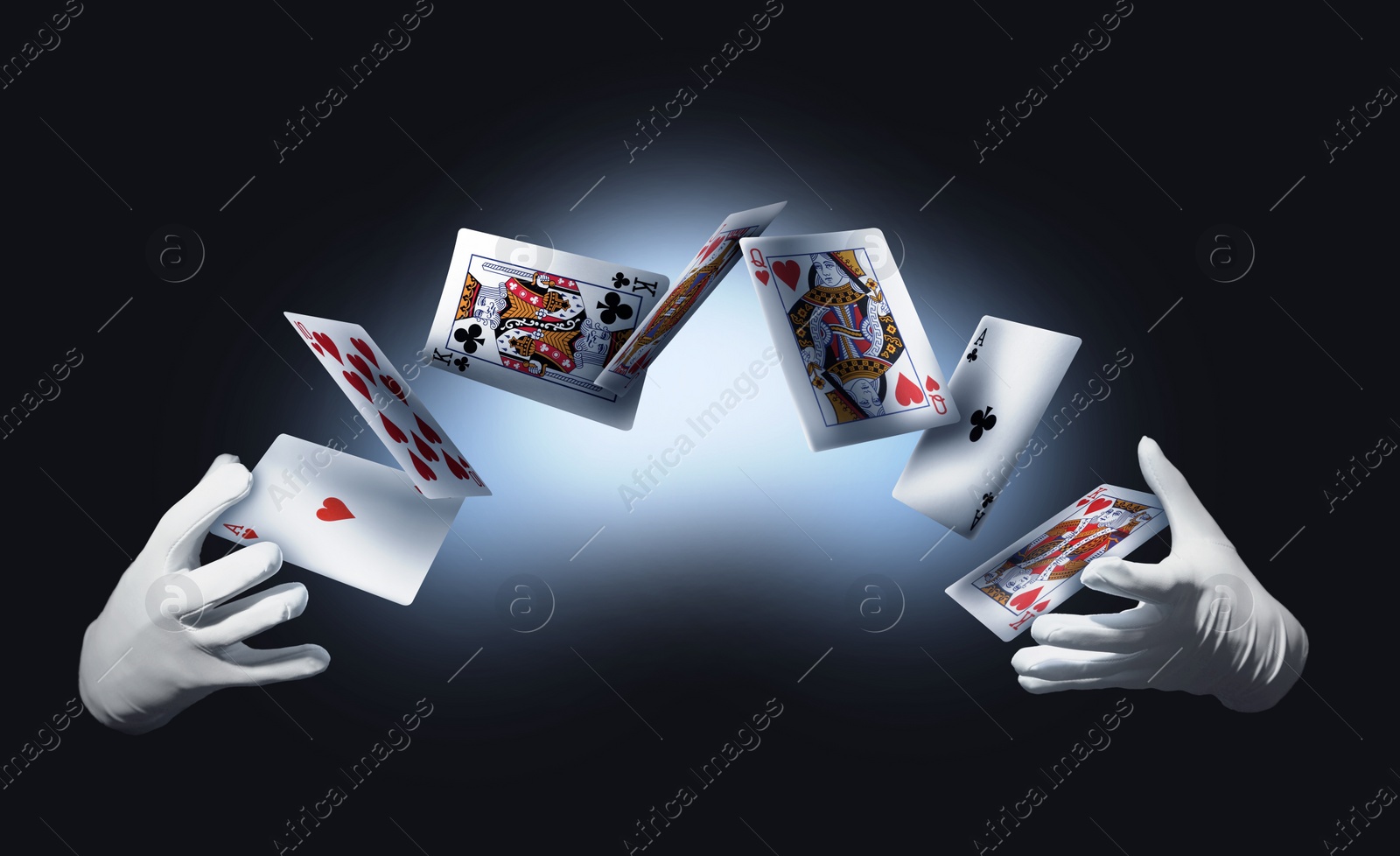 Image of Magician performing card trick on color background, closeup