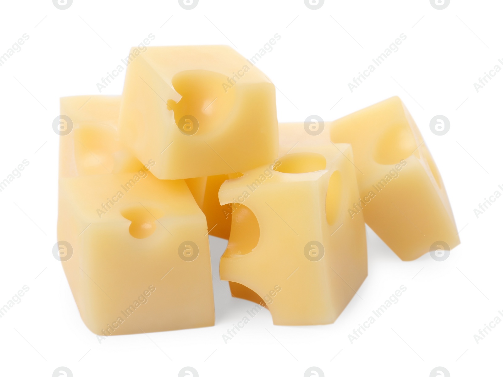 Photo of Cubes of delicious cheese isolated on white