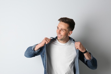 Photo of Portrait of handsome man on light background