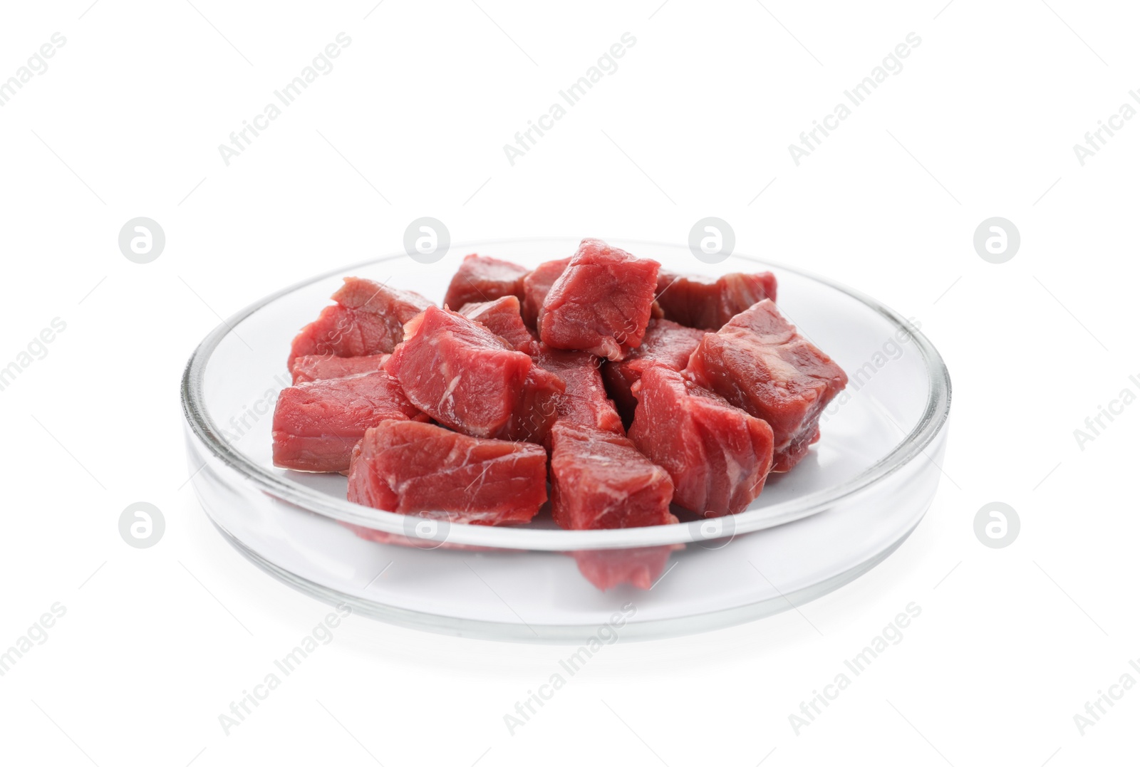 Photo of Petri dish with pieces of raw cultured meat on white background