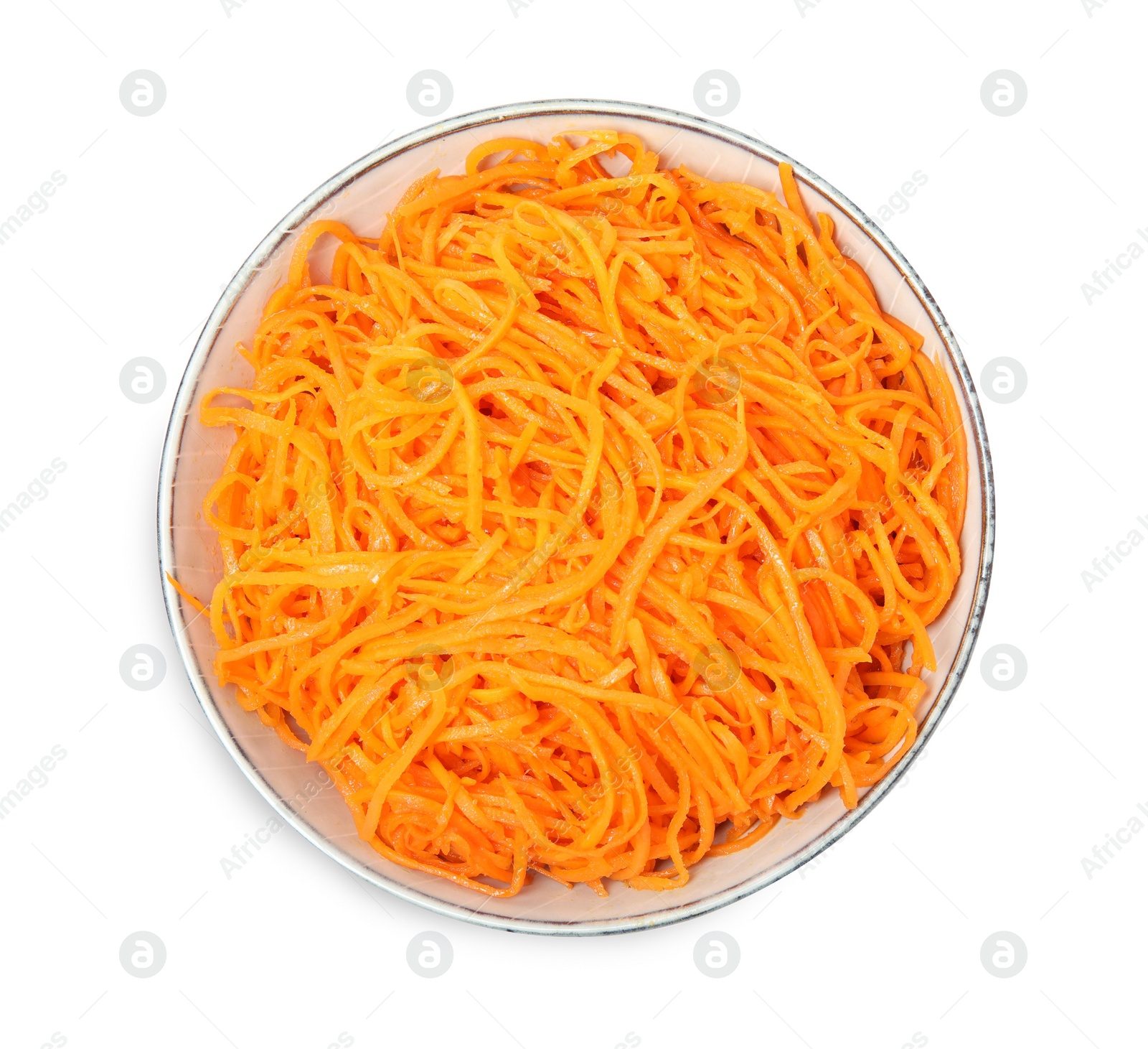 Photo of Delicious Korean carrot salad in bowl isolated on white, top view