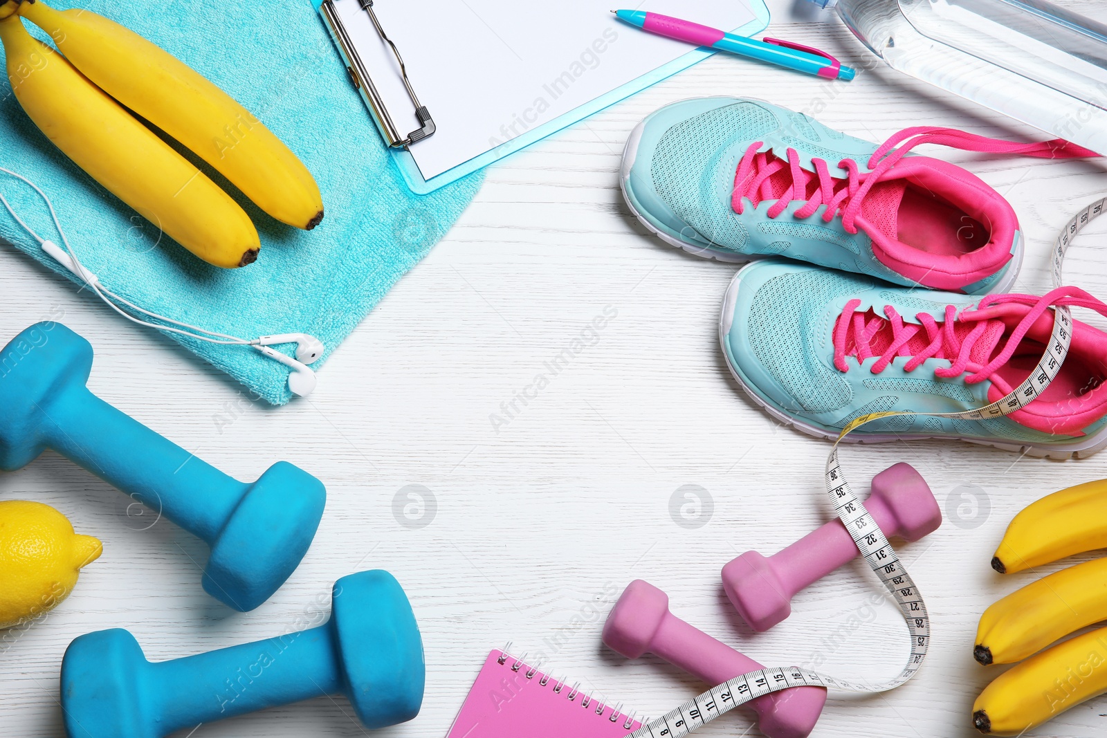 Photo of Flat lay composition with sport items, healthy food and space for text on wooden background. Weight loss concept