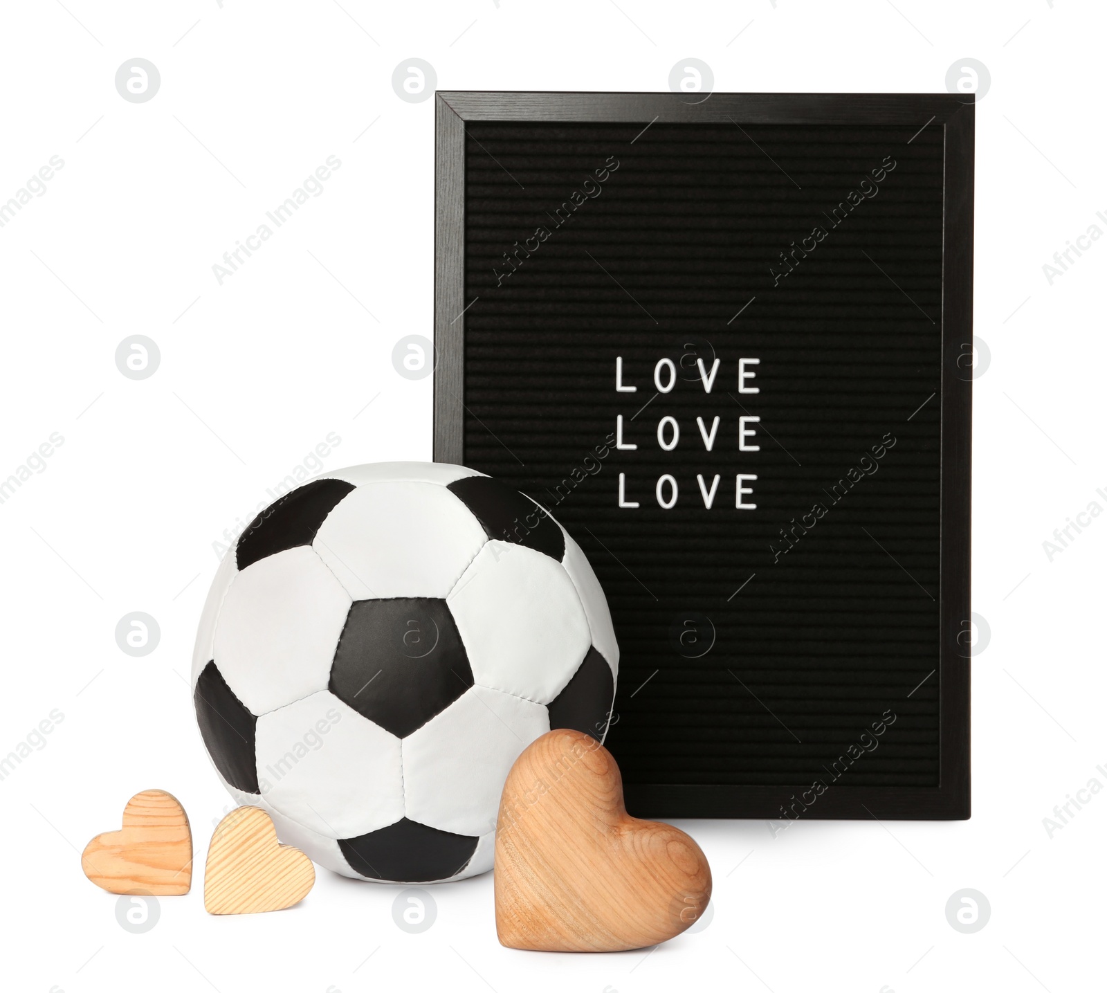 Photo of Soccer ball, hearts and letter board with words Love on white background