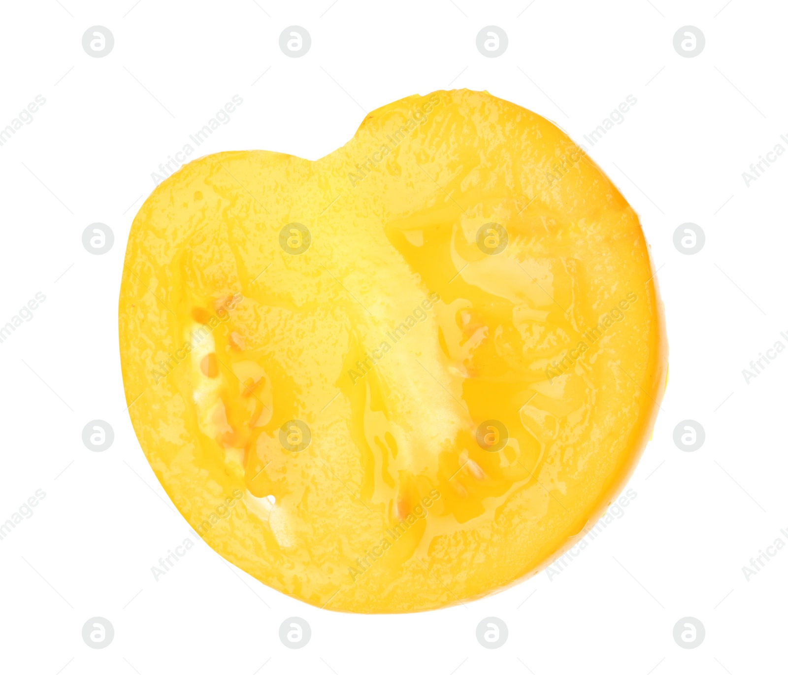 Photo of Slice of yellow tomato on white background