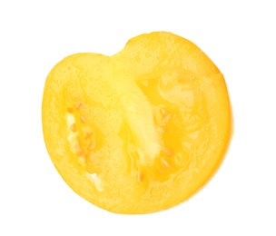 Photo of Slice of yellow tomato on white background