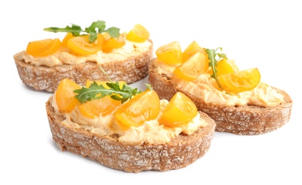 Photo of Tasty fresh tomato bruschettas on white background