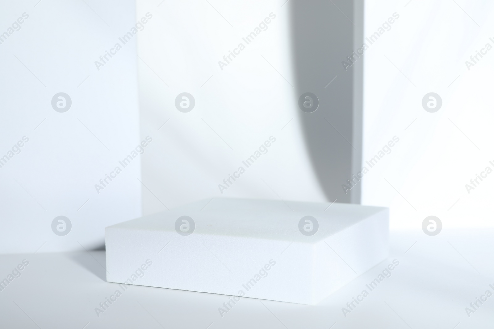 Photo of Presentation of product. Podium on white background, space for text